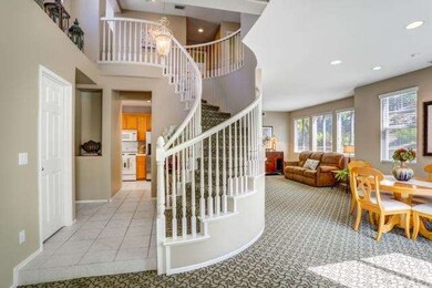 Sweeping staircase, custom paint and high end carp