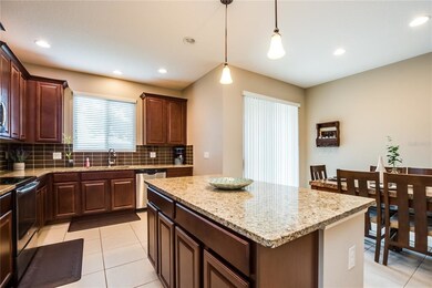 A kitchen island that can be used for dining with 