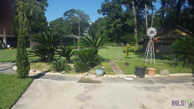 2 outbuildings in background