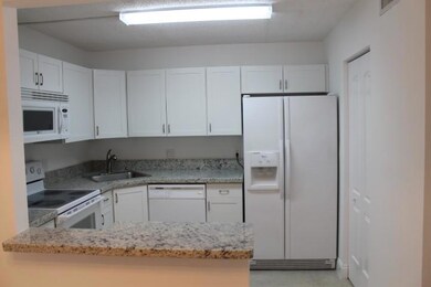 5960 Whispering Pine Way unit D-1, Greenacres, FL 33463 - photo 4