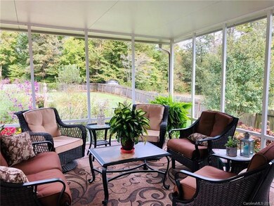 SCREENED PORCH HAS A TRANQUIL SETTING ITS A GREAT PLACE TO BEGIN YOUR DAY OR WIND DOWN!