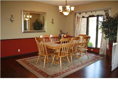 Large formal dining room located near foyer.