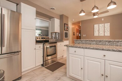 The kitchen includes stainless steel appliances for a great contemporary look.