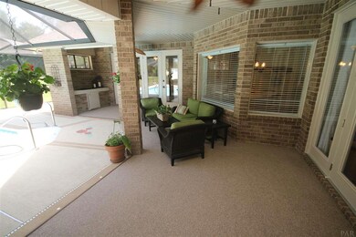 carpet. French door opens to the master suite.