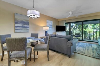 Dining space with light wood-style floors, a ceili
