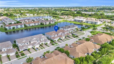 Aerial view of residential area with a large body of water