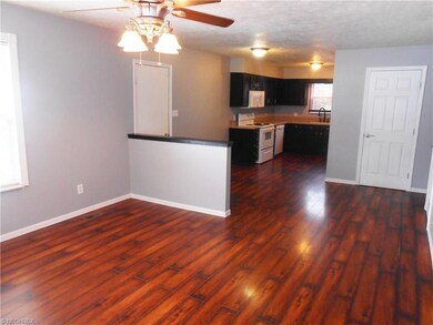 Open Living Room to Kitchen