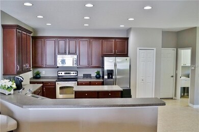 Large beautiful cabinets with the hardware. Plenty of storage in this kitchen including separate pantry.