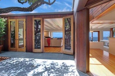 Front and French doors leading into home.