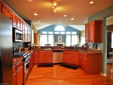A beautiful, modern kitchen with stainless steel a