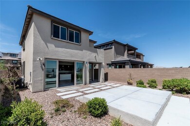 Back of house featuring a patio, stucco siding, an