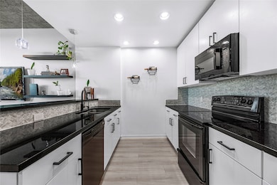 A contemporary kitchen with a sleek, polished vibe