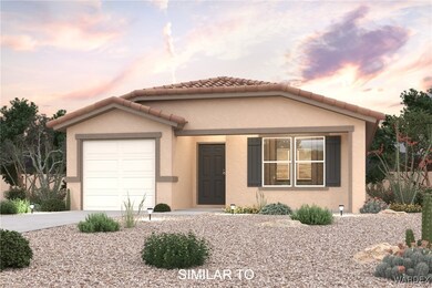 Mediterranean / spanish-style home with a garage,