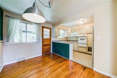 Door off Dining Room Leads to Covered Patio