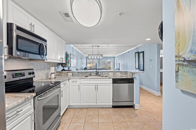 Kitchen with appliances with stainless steel finis