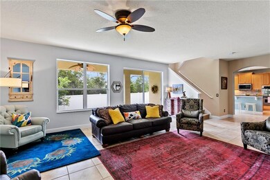 Family room is bright w/ views of & access to priv