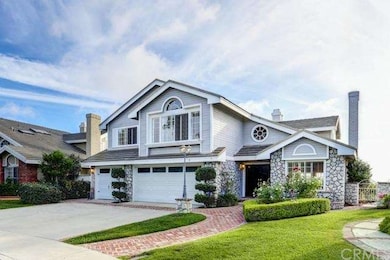 Cape Cod style home located 2nd house from the end