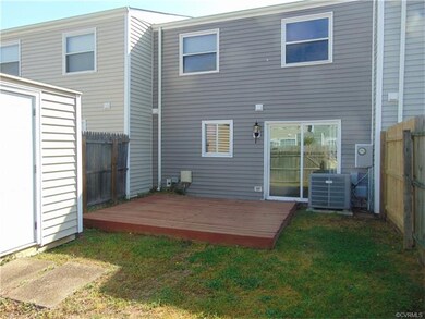 Fenced rear yard with new sliding door