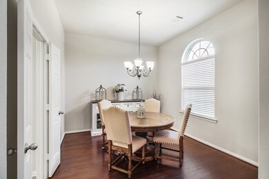 Formal Dining room has easy access to the Built-in office/study nook and Kitchen. Tons of natural lighting flowing in from the windows which provide relaxing views of the front yard.