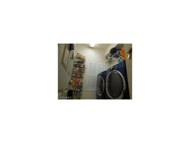 Laundry Room next to half bath on first level