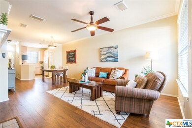 Looking at the family room, dining area & kitchen