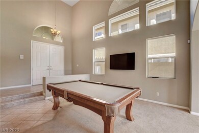 Step down into the living room with lots of natura
