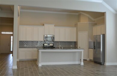 Open concept kitchen allows the family chef to cre