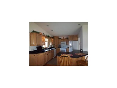 Kitchen. Custom hickory cabinets makes this kitche