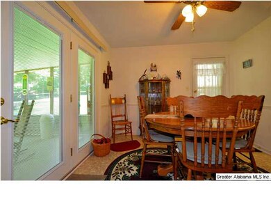 Very nice screened-in porch is just off of family 