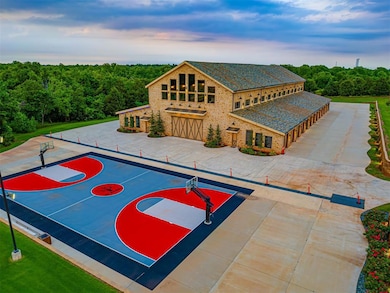 Full outdoor basketball court with terraced seating.