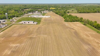 Birds eye view of property featuring a view of tre