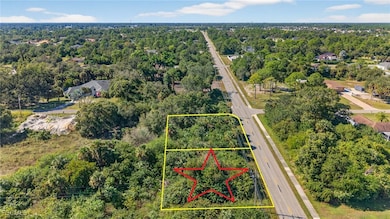 Aerial view of property's location featuring property parcel outlined