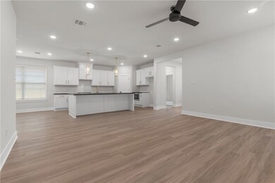 Photos are of a previous build. Floor plan is the