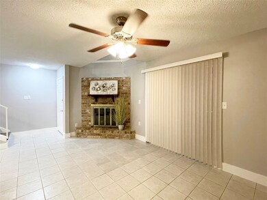 View of the fireplace in the living room.