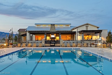 Community pool featuring a patio area