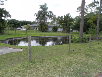 Pond on side of home
