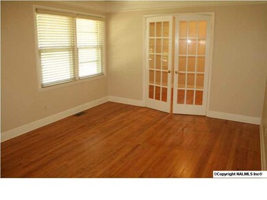 Madison, AL 35758 - Adorable full brick, 3 bedroom, 2 bath updated w/ all new vinyl windows & is move in ready. Home has tile & hardwood floors, tons of storage & french doors leading to deck w/ huge private yard