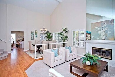 Formal living and dining room with vaulted ceiling