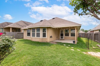 Covered patio and double door with doggy door