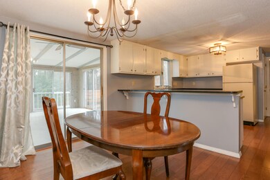 DR to kitchen to  sun room
