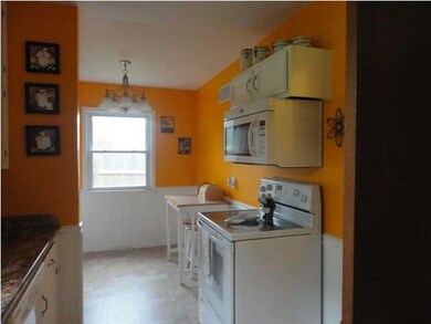 Another view of kitchen, eating area in kitchen is