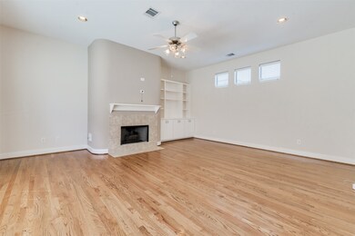 Living room with fireplace and built-ins