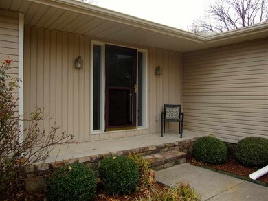 Lovely front porch is a wonderful way to spend a lazy afternoon - and get to know your neighbors!