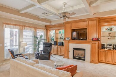 Lovely gas fireplace in the lighted wall of shelve