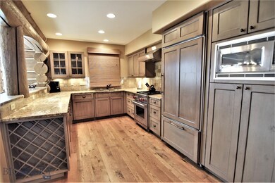 Main level kitchen off entry and garage.