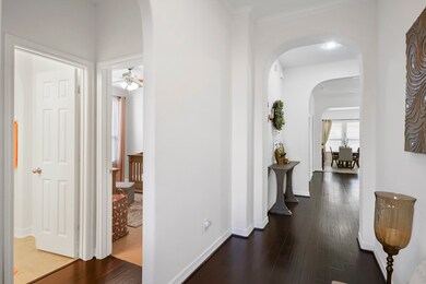 As you enter the home there is a hallway to the left with 2 bedrooms and a bathroom.