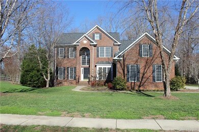 Full brick home on private wooded lot!