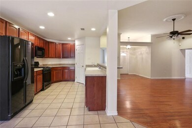 Kitchen has walk in pantry, breakfast bar and brea
