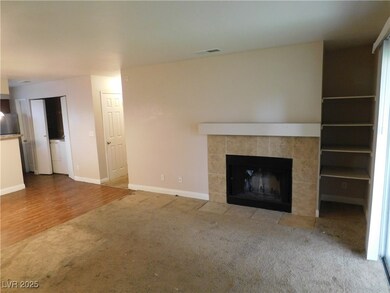 Unfurnished living room featuring visible vents, a