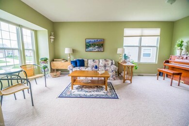Beautiful, sun-filled living room with a window alcove.